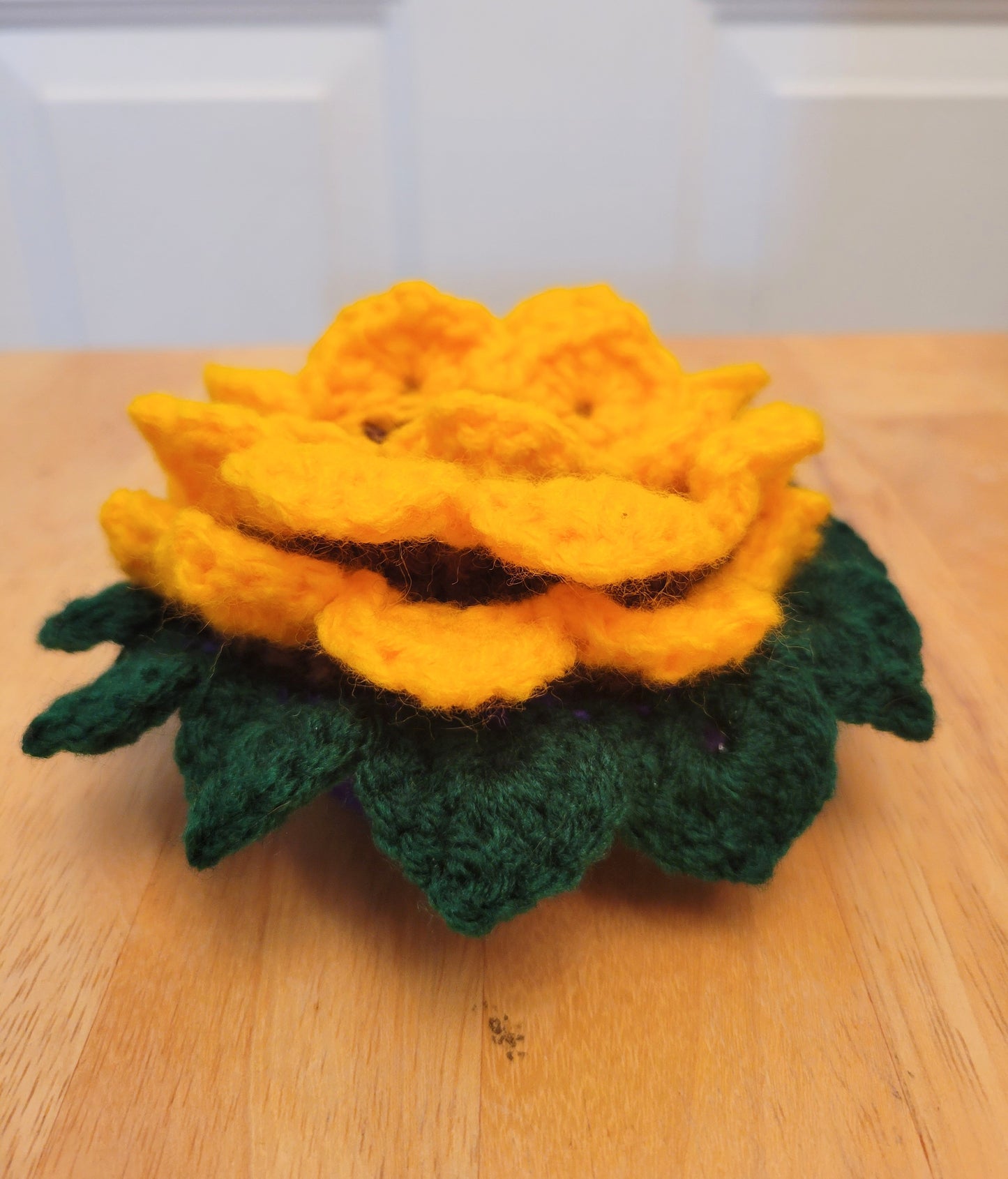 Sunflower coasters in flower pot looking like a flower