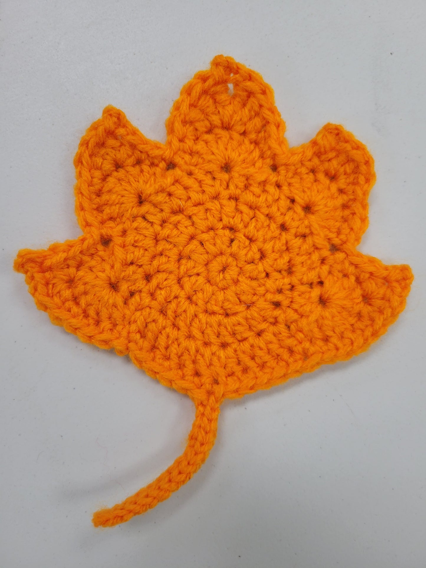 Close up of orange coaster