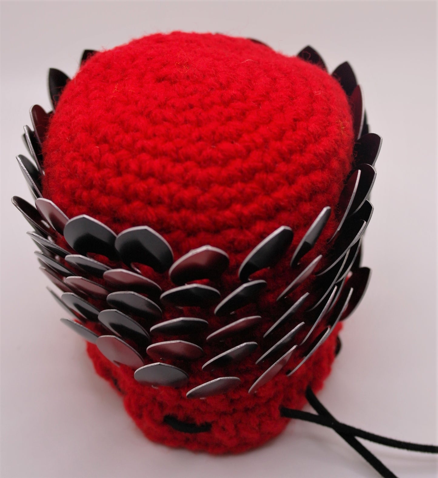 The bottom of the dragon scale dice bag.