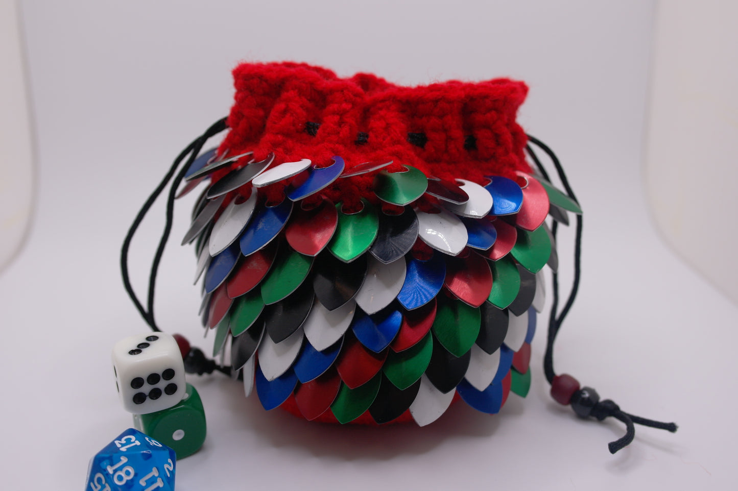 Bag has a black drawstring closure