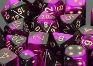 7 piece purple and black dice set with gold numbers